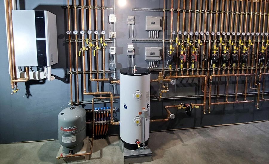 A view of a hydronic heating system with boiler and control valves